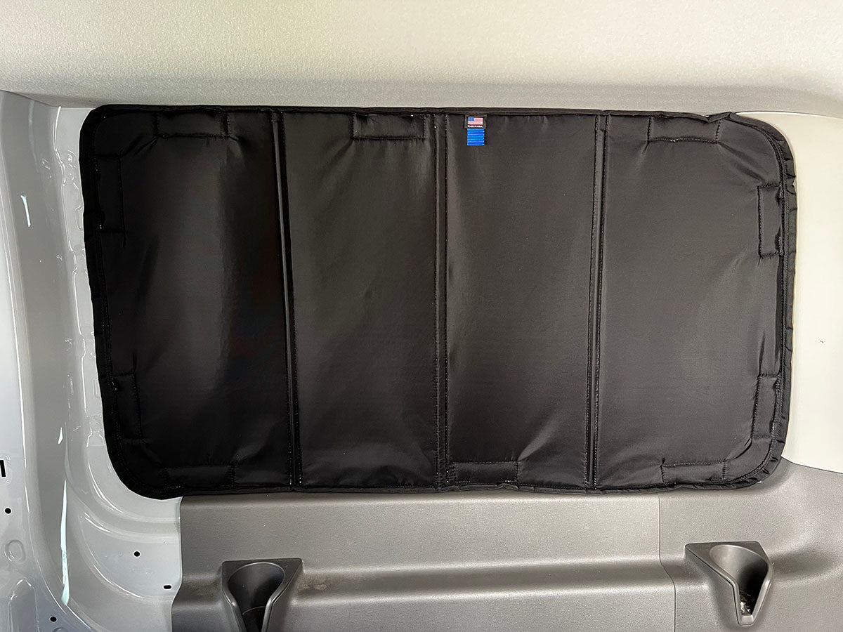 Ford Transit Crew Van window shade fits with tabs between the window and stock van window trim or window lining. Window cover doesn't need magnets, velcro stickers, or any other mounting hardware to be installed